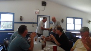 Mike KK4NLC who found the fox first is congratulated by club president Bill KR4LO